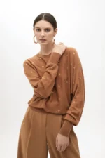 Drop sleeve sweater with eyelets