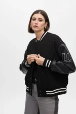 Bomber jacket featuring rhinestone and faux leather details