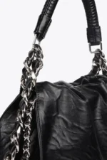 Medium-sized wrinkled faux leather bag with metal details and XL studs - Image 4